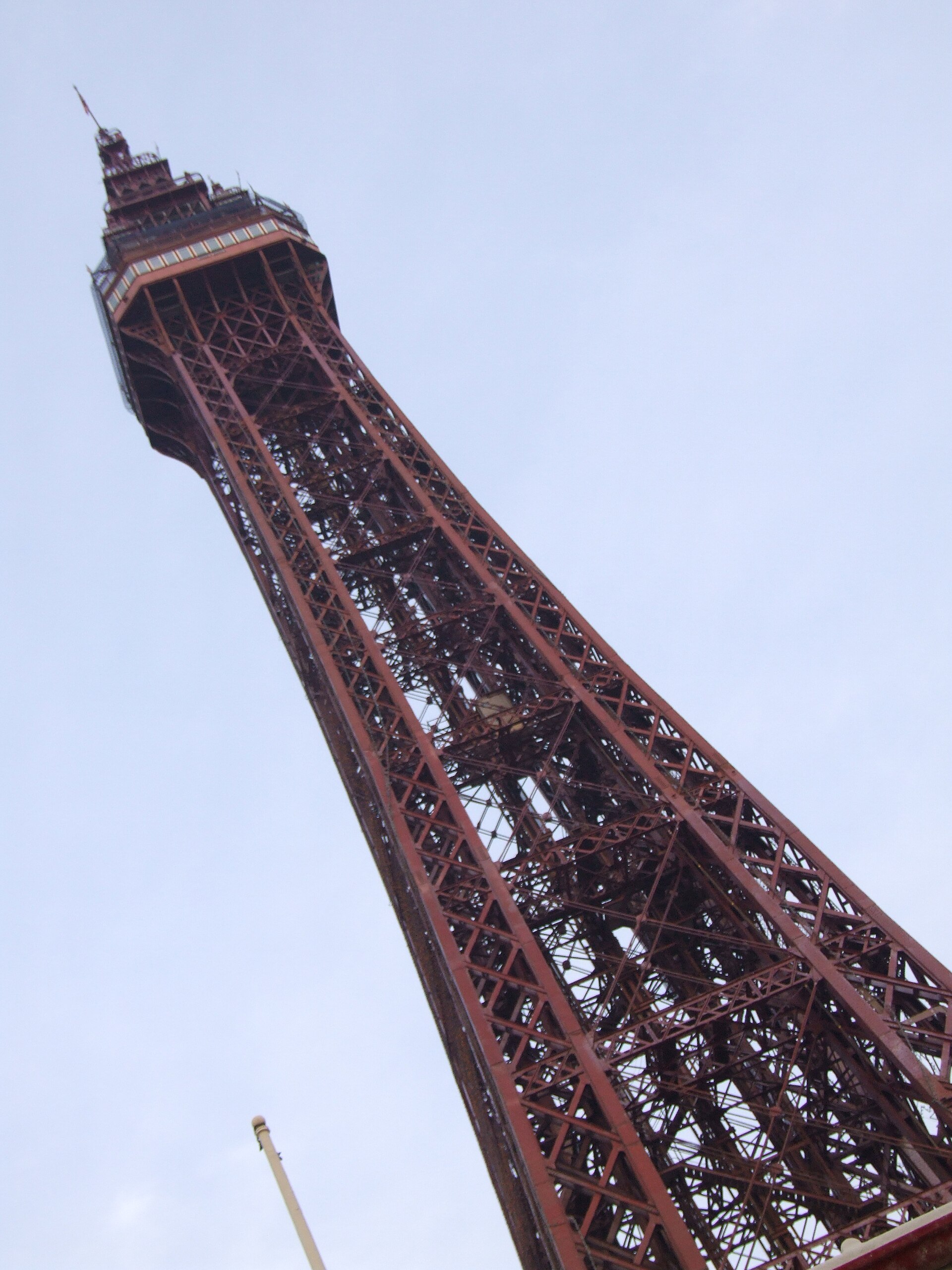 Blackpool Tower photographed from below against a pale sky